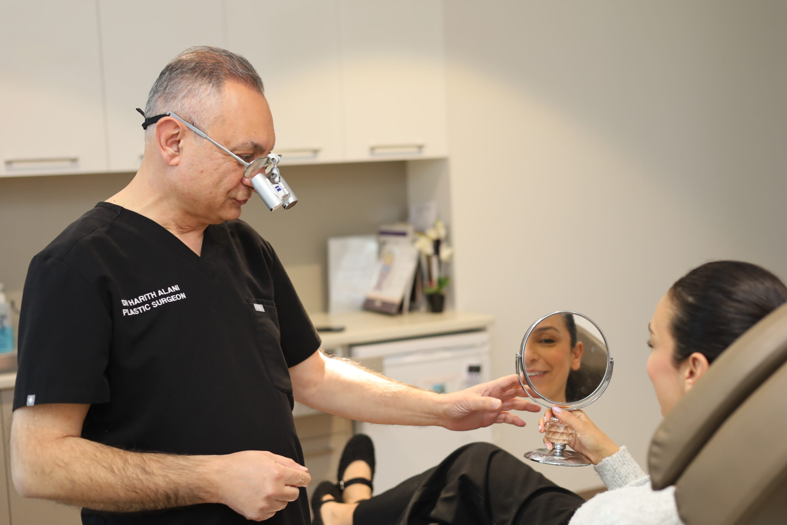 Dr Harith Alani consulting with a patient at My Klinik